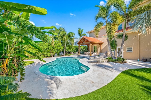 view of pool featuring a gazebo and a patio area