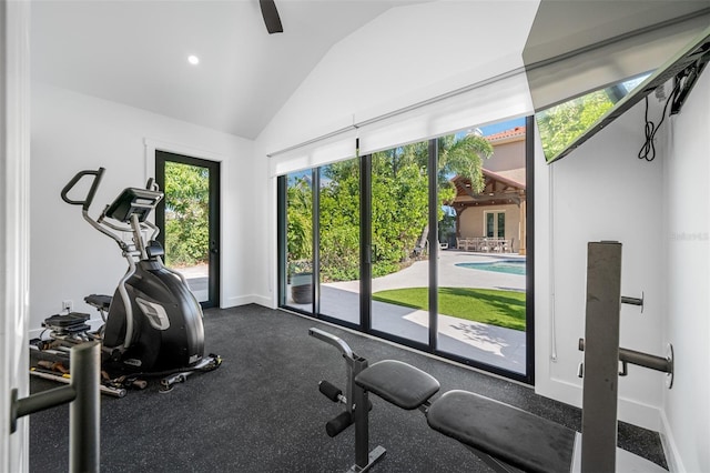 workout room featuring vaulted ceiling