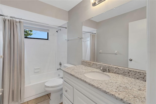 full bathroom with vanity, tile patterned floors, toilet, and shower / bath combo with shower curtain