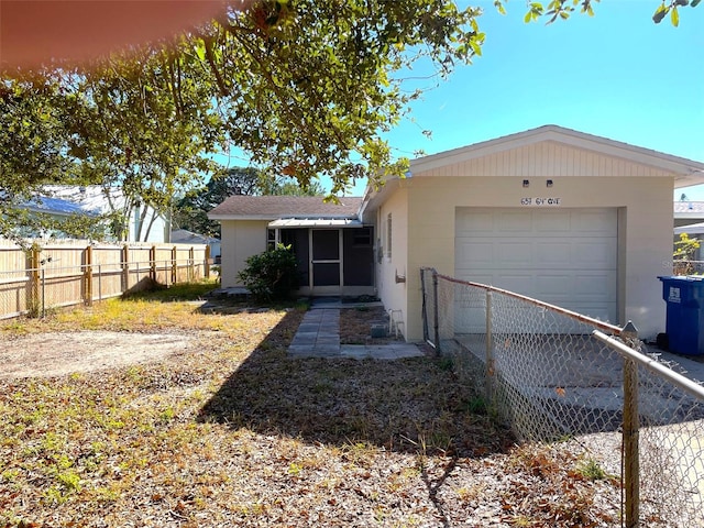 view of front of house with a garage