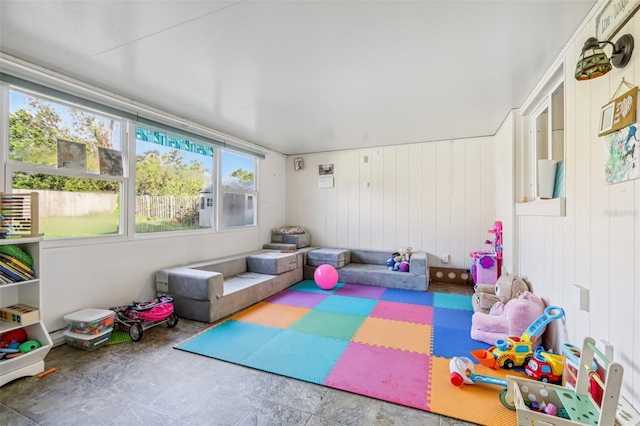 playroom with wood walls