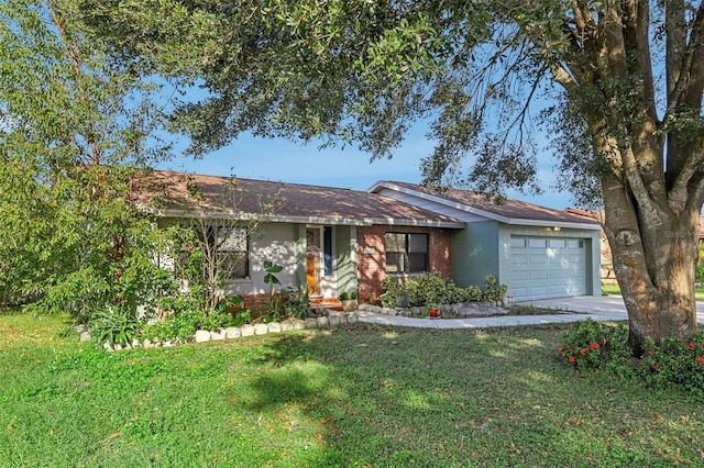 single story home with a garage and a front lawn