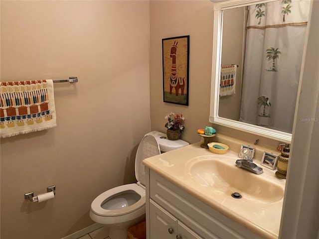 5105 Garden Vale Ave, Tampa, FL 33624 - full bath featuring toilet, vanity, and tile patterned flooring