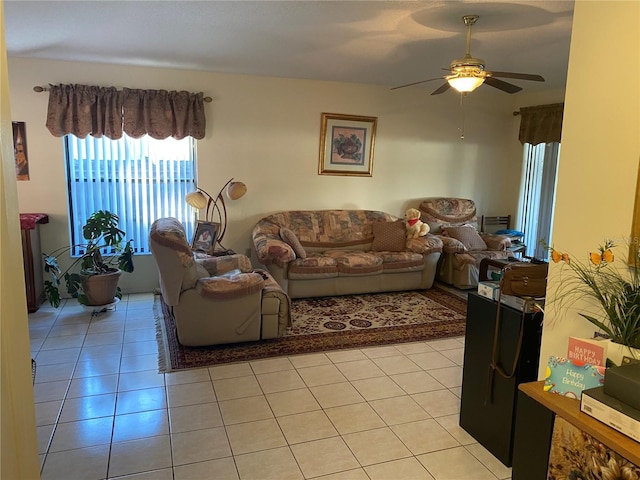 5105 Garden Vale Ave, Tampa, FL 33624 - living area featuring ceiling fan and light tile patterned floors
