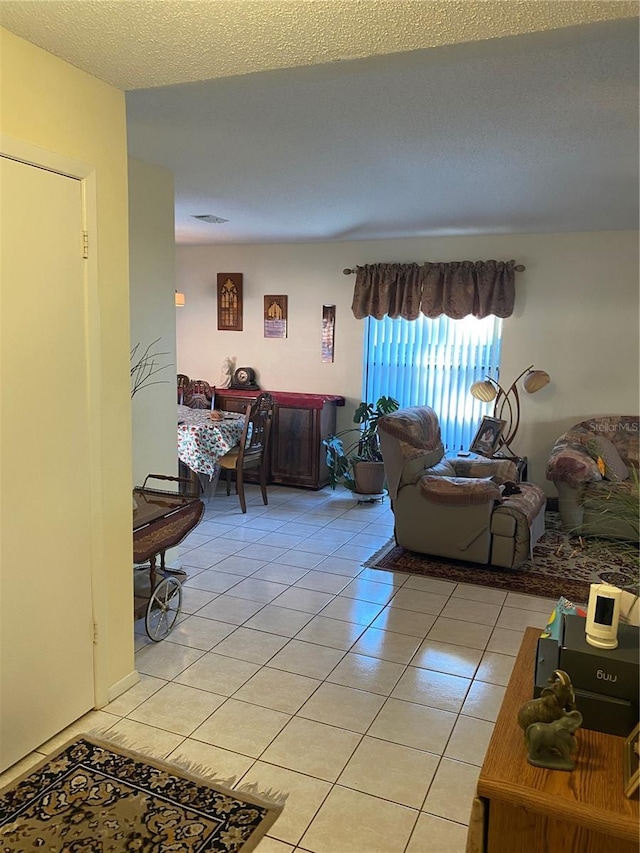 5105 Garden Vale Ave, Tampa, FL 33624 - living area featuring light tile patterned flooring