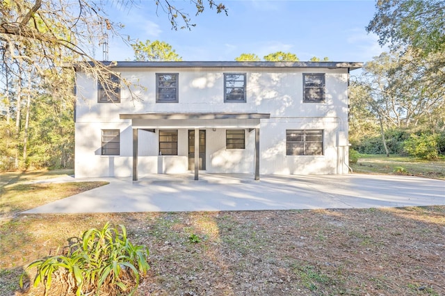 view of front of home with a patio area