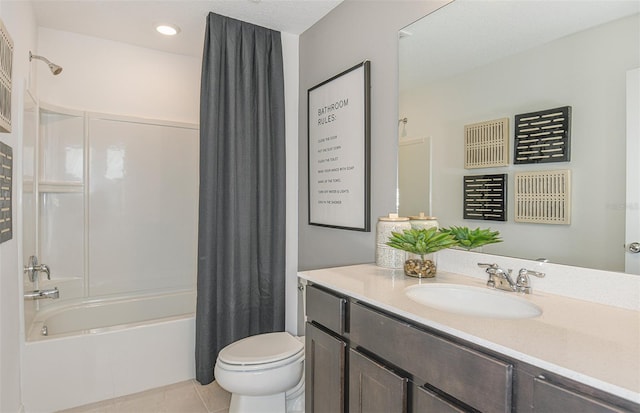 full bathroom with shower / bathtub combination with curtain, tile patterned flooring, vanity, and toilet