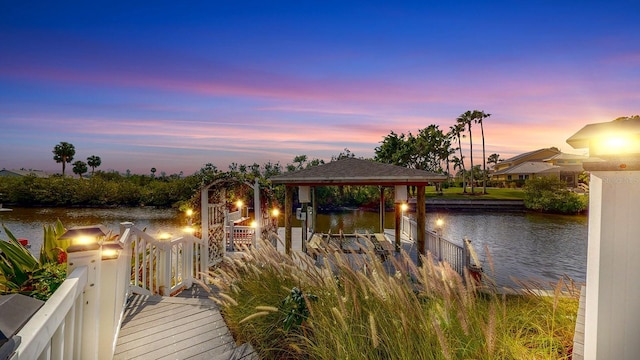 dock area featuring a water view and boat lift