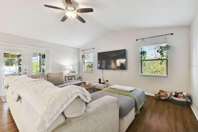 living room with french doors, dark hardwood / wood-style floors, a wealth of natural light, and ceiling fan