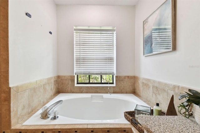 bathroom with tiled tub