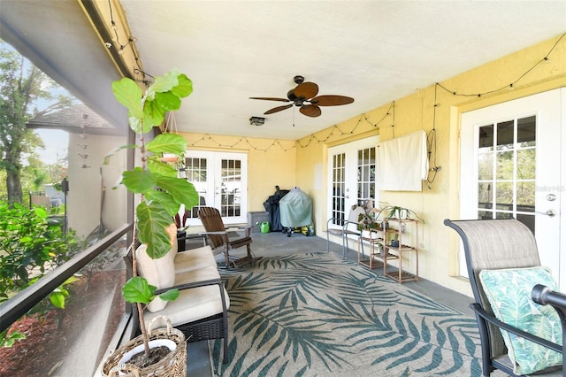 exterior space with area for grilling, ceiling fan, french doors, and a balcony