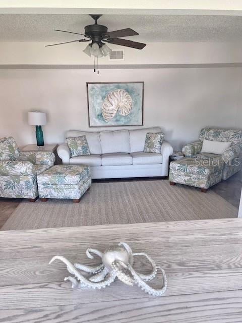 living room with ceiling fan