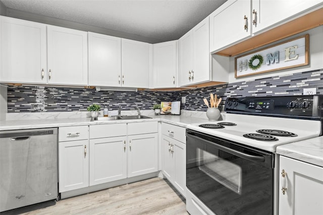 kitchen featuring dishwasher, white cabinetry, electric stove, and a textured ceiling