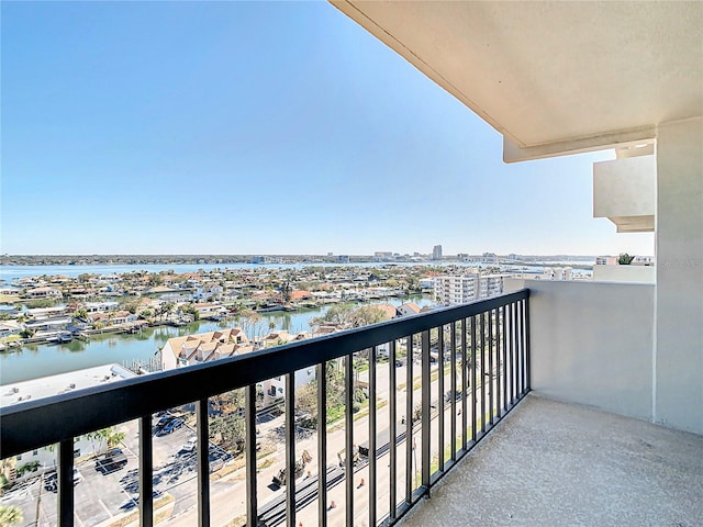 balcony featuring a water view