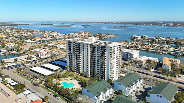 400 Island Way Unit 1411, Clearwater Beach, FL 33767 - drone / aerial view of a nearby body of water, apartment complex / building, and a pool area