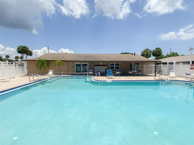 view of pool featuring a patio