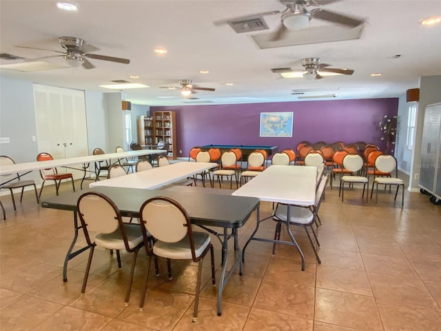 dining space featuring light tile patterned flooring