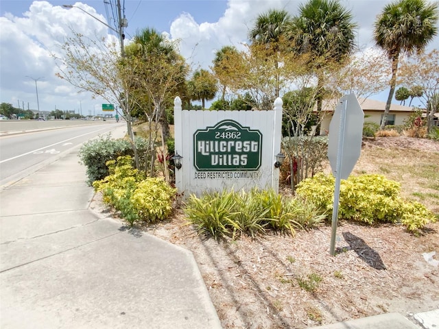 view of community sign