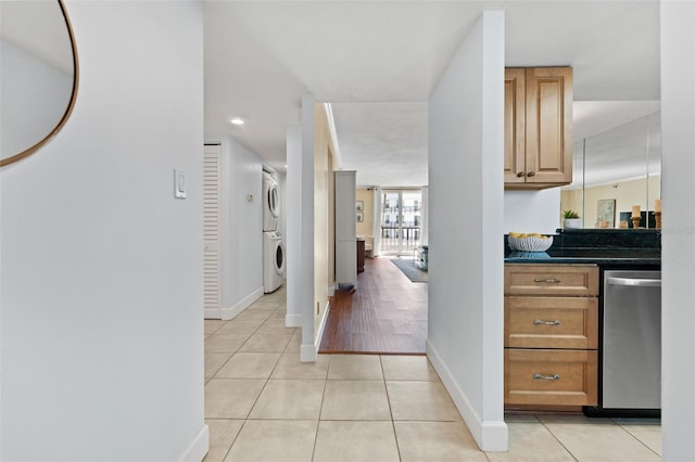201 W Laurel St Unit 503, Tampa, FL 33602 - hall with stacked washer and clothes dryer, baseboards, light tile patterned floors, and recessed lighting