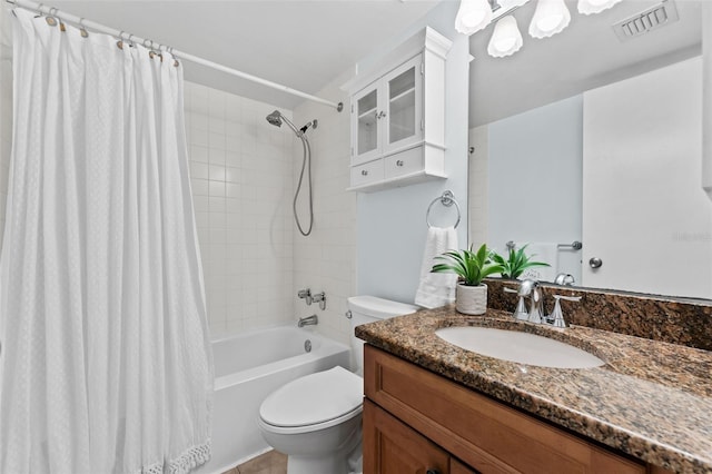 full bathroom with vanity, toilet, and shower / bath combo with shower curtain