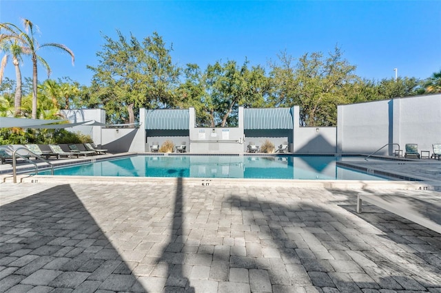 view of pool featuring a patio area