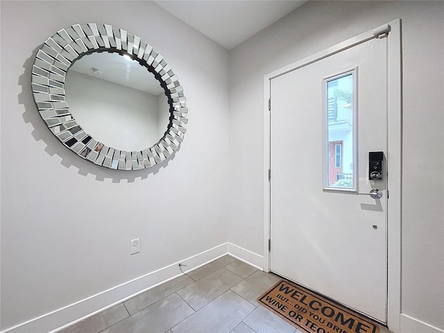 foyer entrance featuring tile patterned floors