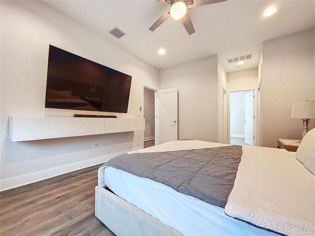 bedroom featuring hardwood / wood-style floors and ceiling fan