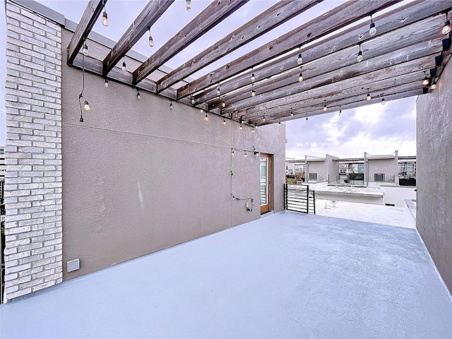 view of patio / terrace featuring a pergola