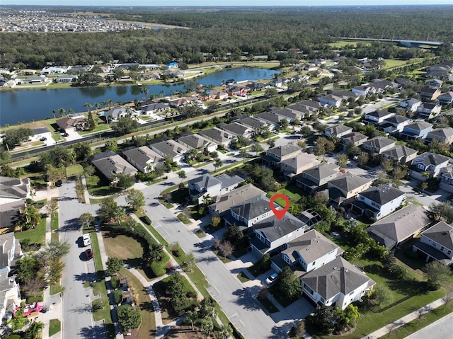 drone / aerial view with a water view