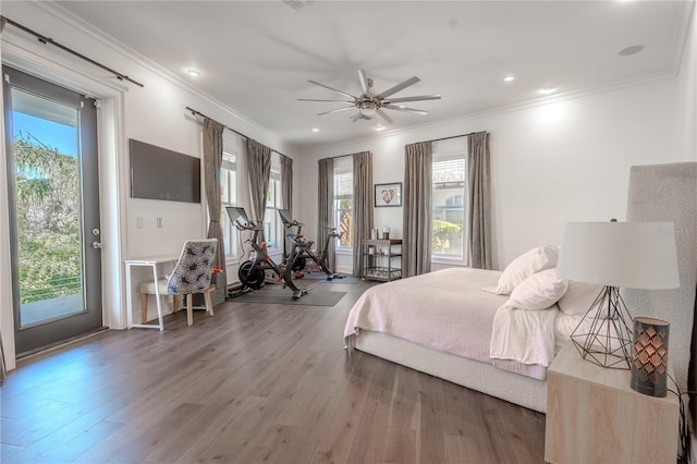 bedroom with crown molding, access to outside, hardwood / wood-style floors, and ceiling fan