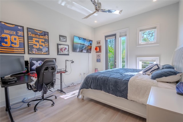 bedroom featuring ceiling fan, access to outside, and light wood-type flooring