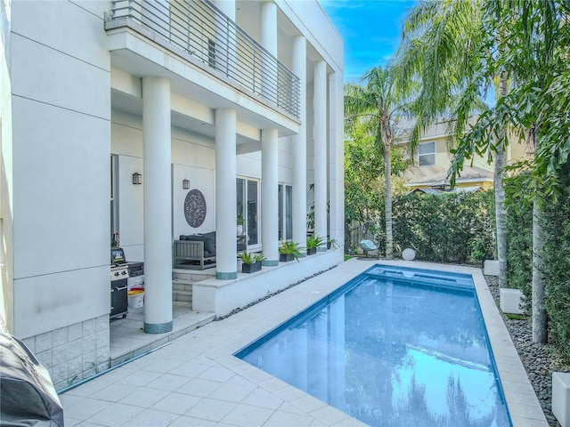 view of pool with a patio