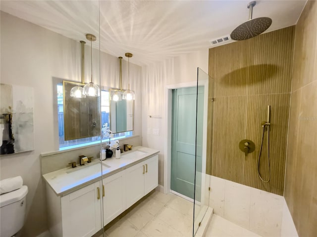 5516 Golden Dr, Tampa, FL 33634 - full bathroom with a walk in shower, double vanity, and toilet