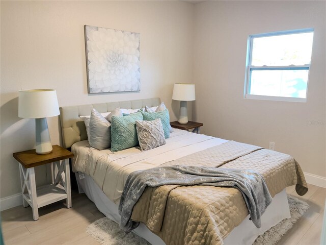 bedroom featuring light wood-type flooring