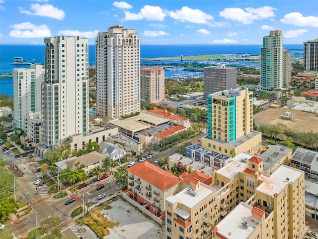 aerial view featuring a water view and a view of city