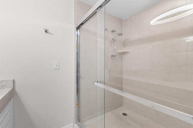 bathroom featuring a shower stall