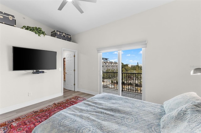 bedroom with access to outside, wood finished floors, baseboards, and a ceiling fan