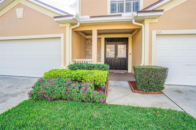 property entrance with a porch and a garage