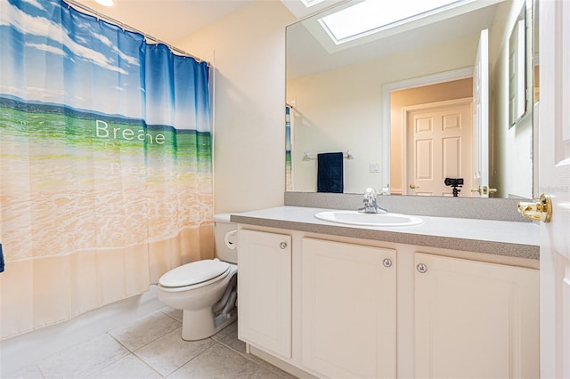 full bathroom with vanity, shower / bath combination with curtain, a skylight, tile patterned flooring, and toilet