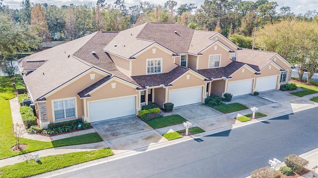 view of front of home with a garage