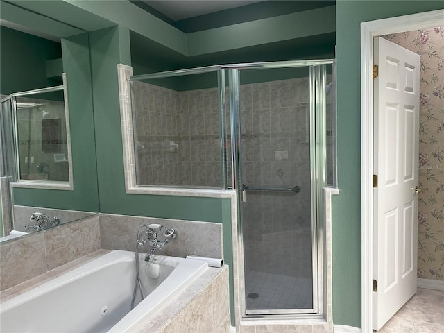 bathroom featuring independent shower and bath and tile patterned flooring