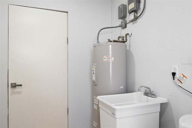 utilities featuring sink and water heater