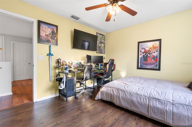 bedroom featuring ceiling fan and dark hardwood / wood-style flooring