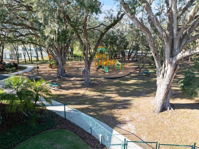 view of home's community with a playground