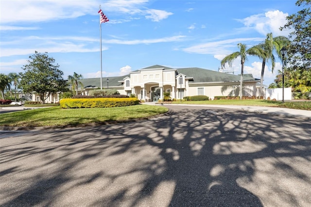 18127 Sandy Pointe Dr, Tampa, FL 33647 - view of building exterior featuring fence and driveway