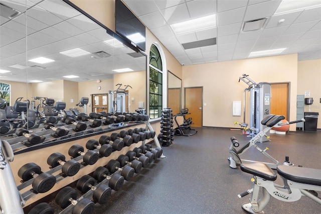 18127 Sandy Pointe Dr, Tampa, FL 33647 - exercise room with a drop ceiling and baseboards