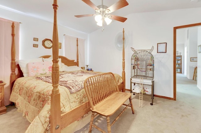 carpeted bedroom featuring ceiling fan and lofted ceiling