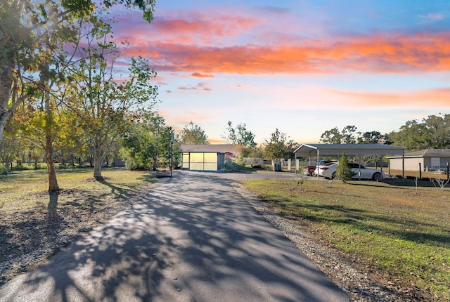 view of front of property featuring a carport