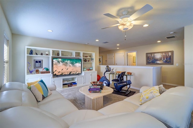 living room featuring ceiling fan