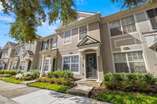 10334 Estero Bay Ln, Tampa, FL 33625 - townhome / multi-family property with stucco siding